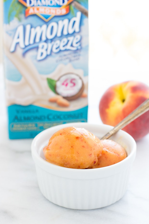 No Churn Fresh Peach Sorbet- made with just 4 simple ingredients! Dairy-free, refined sugar-free and only 100 calories per serving!
