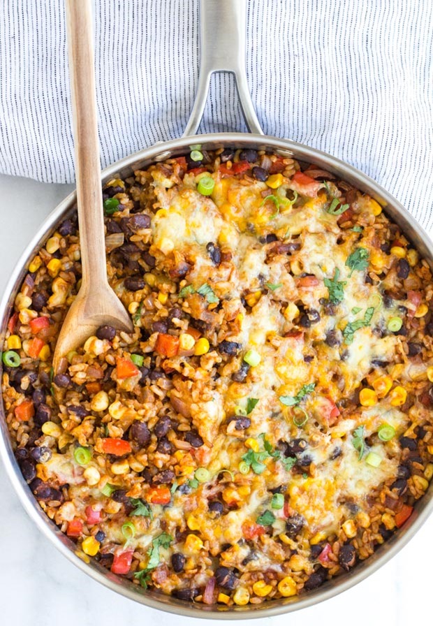 One Skillet Mexican Rice Casserole- an easy dinner recipe with almost zero clean up! #glutenfree #cleaneating #meatless #vegetarian