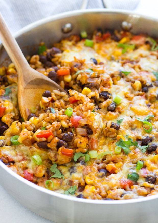 One Skillet Mexican Rice Casserole- an easy dinner recipe with almost zero clean up! #glutenfree #cleaneating #meatless #vegetarian