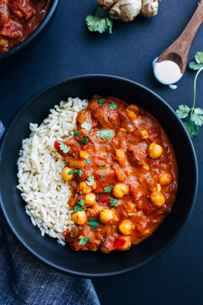 One Pot Chickpea Tiki Masala- an easy and nutritious meal made with warming spices, fire roasted tomatoes, fresh ginger and coconut milk. Just 30 minutes to make! (vegan + gluten-free)