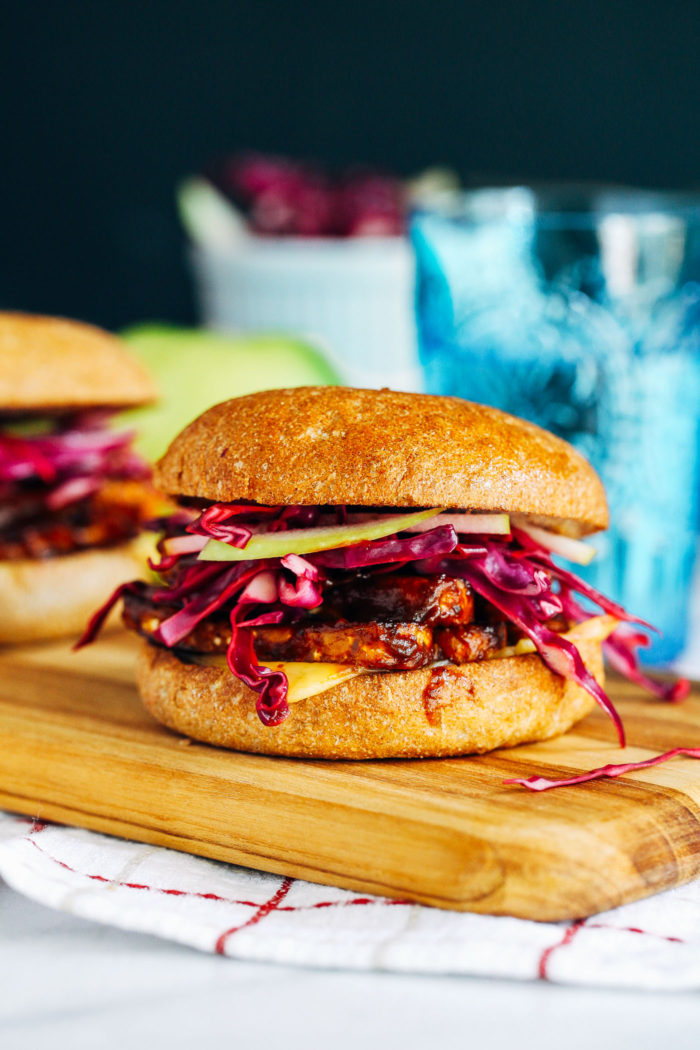 BBQ Tempeh Sandwiches with Tangy Apple Slaw- barbecue tempeh topped with vegan smoked gouda and a tangy apple slaw. The perfect summer sandwich! 