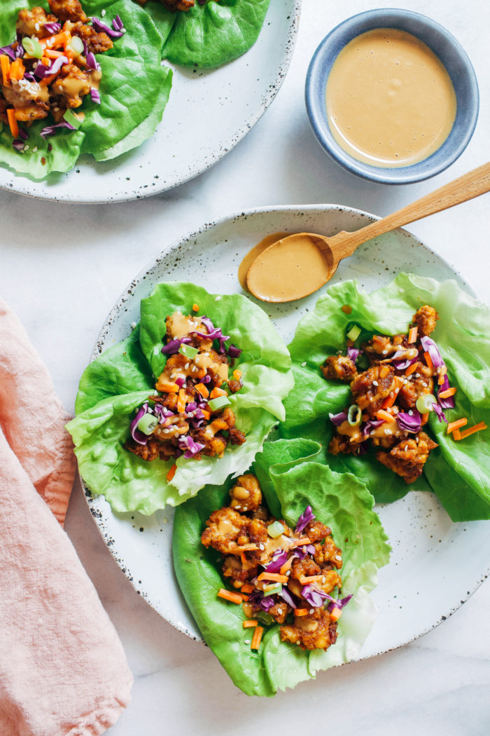 Peanut Sauce Tempeh Lettuce Wraps- crumbled tempeh is sautéed in savory peanut sauce and served in crisp lettuce wraps for a light and refreshing plant-based meal! (vegan, gluten-free, grain-free, low carb)