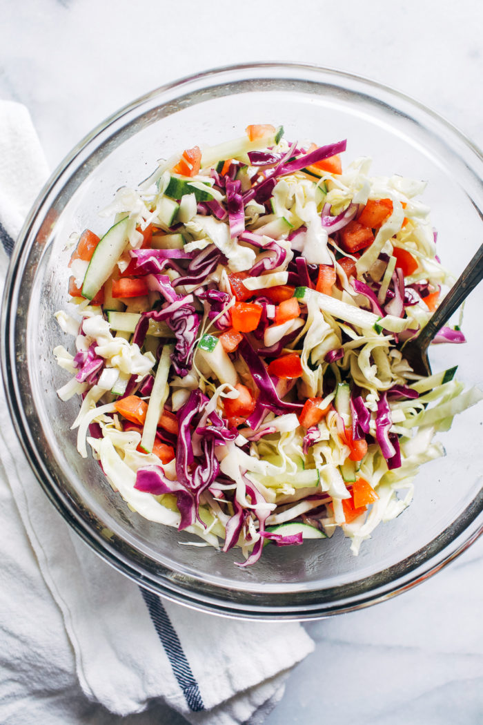Cucumber Tomato Coleslaw- tangy and refreshing, this mayo-free coleslaw is the perfect summer side. Just 8 ingredients to make! (plant-based, gluten-free)