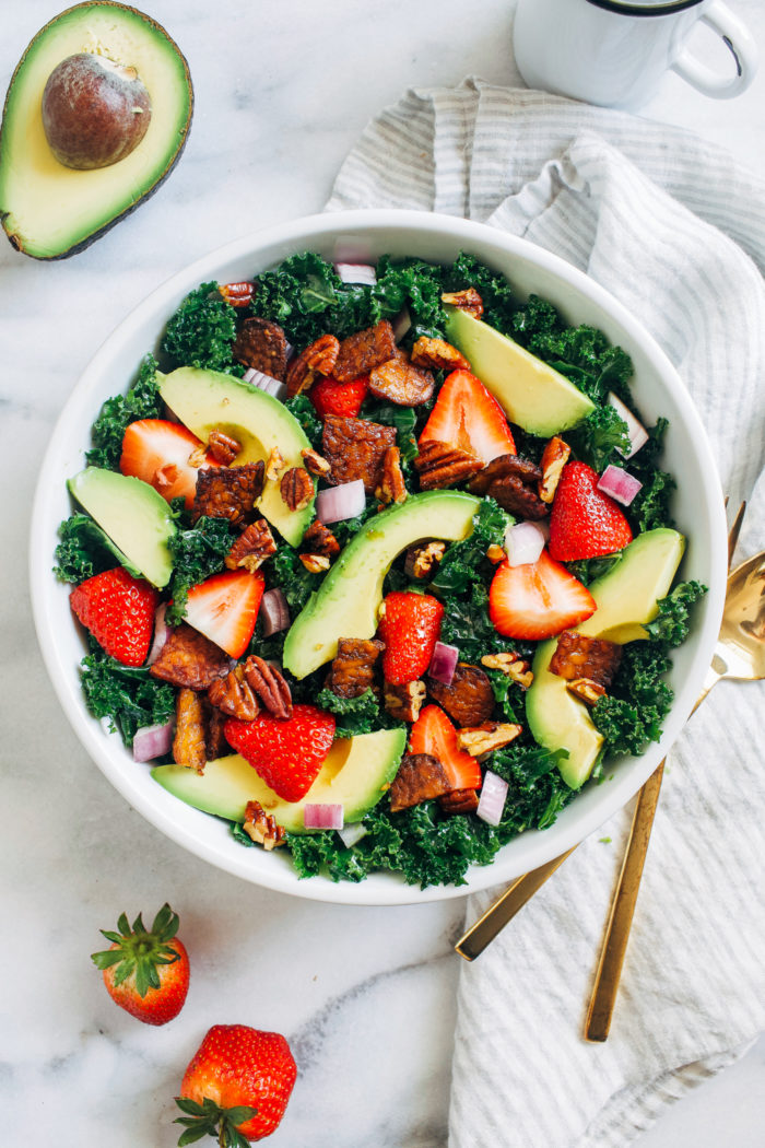 Strawberry Kale Salad with Tempeh Bacon- massaged in a balsamic vinaigrette, this nutritious salad is bursting with texture and flavor! (vegan + gluten-free)