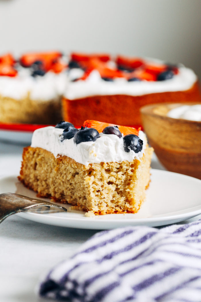 Vanilla Almond Flour Cake with Berries and Whipped Cream- naturally sweetened with a perfect crumb, no one will ever guess this cake is dairy-free and gluten-free!