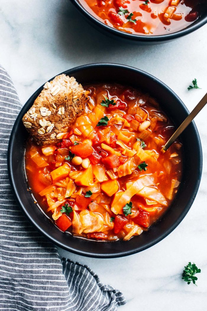 Easy White Bean and Cabbage Soup- a healthy soup that's packed full of fiber, vitamins, protein and iron. Vegan, grain-free and freezes well too! 