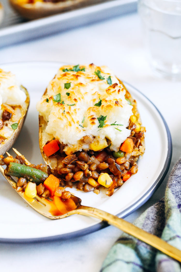 Twice Baked Lentil Shepherd's Pie Potatoes- a fun plant-based take on the Irish classic, these potatoes are stuffed with wholesome lentils and veggies for an easy and delicious meal! (gluten-free)