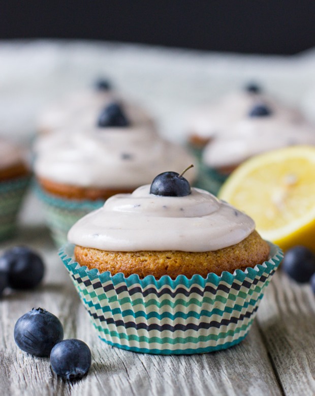 Lemon Cupcakes with Fresh Blueberry Icing | Made with gluten-free quinoa and almond flour + naturally sweetened with honey!