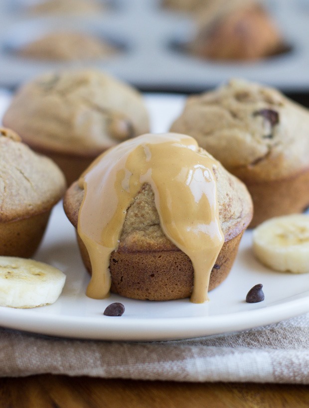 Flourless Peanut Butter Banana Muffins- made without dairy, gluten, oil OR refined sugar. One muffin has as much protein as an egg + they're so moist and delicious, you would never guess that they’re healthy!