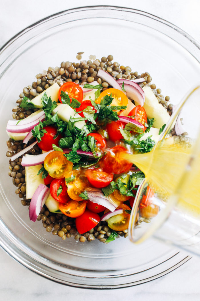 Lentil Cucumber & Tomato Salad- summer's best vegetables tossed in a tangy lemon dressing. Served with fresh herbs, it makes for a light and refreshing summer meal!