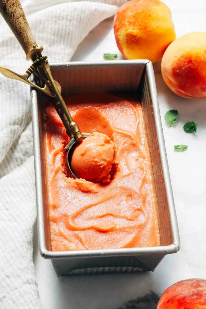 Fresh Peach Sorbet- naturally sweetened with honey, this dairy-free sorbet comes together with just 5 simple ingredients. No ice cream maker required! (vegan option, gluten-free)