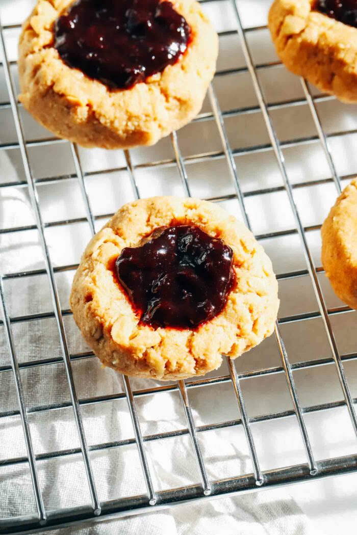 Peanut Butter and Jelly Oatmeal Cookies- made with whole grain oat flour, almond flour and rolled oatmeal, these cookies are a fun and wholesome treat for all ages!  (vegan, gluten-free)
