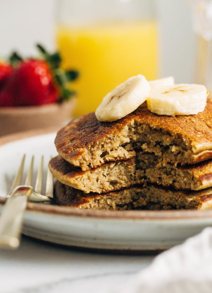 Banana Oatmeal Pancakes- light, fluffy and naturally sweet, these wholesome pancakes are made easy in a blender! (gluten-free and dairy-free)