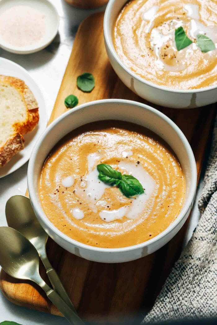 Creamy Roasted Eggplant Tomato Soup- caramelized eggplant and juicy ripe tomatoes come together for an irresistible and creamy soup that’s secretly vegan and gluten-free!