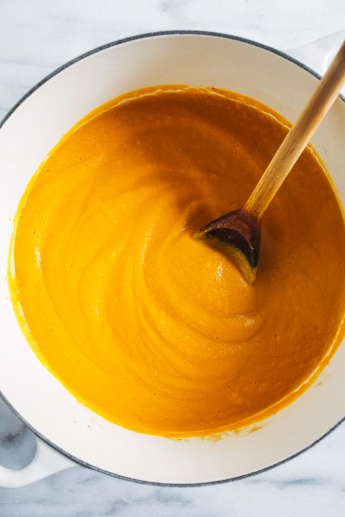 Carrot Ginger Soup with Maple Yogurt- cooked with fresh ginger, this comforting soup is packed full of flavor and easy to make! (vegan)