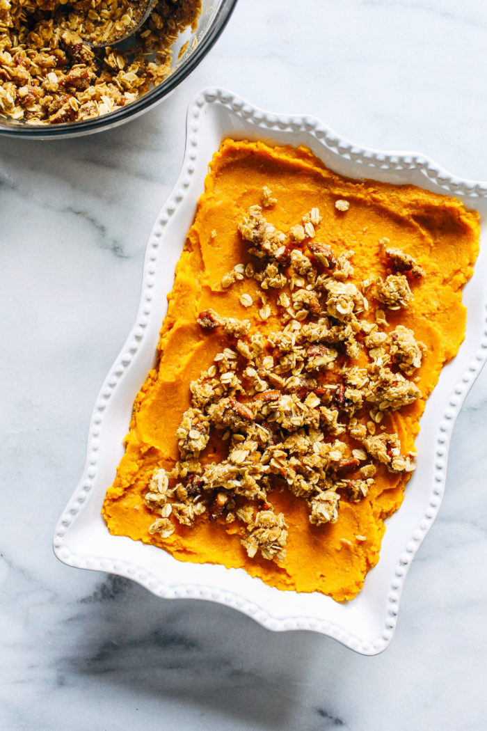 Butternut Squash and Sweet Potato Casserole with Pecan Crumble- butternut squash lightens up the traditional texture of sweet potato casserole and gets topped with delicious clusters of pecan crumble. Altogether it makes for one irresistible side item! (vegan and gluten-free)