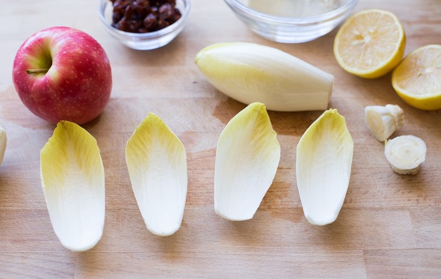 Endive leaves filled with crisp apples, creamy goat cheese, and crunchy smoked almonds make for an easy and delicious appetizer that everyone will love!