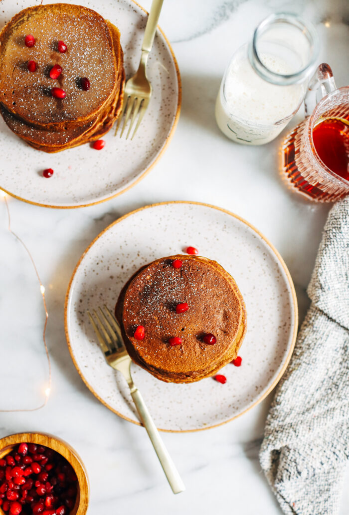 Healthy Gingerbread Pancakes- made with pumpkin puree, whole grain oats, and molasses. Each pancake packs 5 grams of protein!  Gluten-free, dairy-free and oil-free.