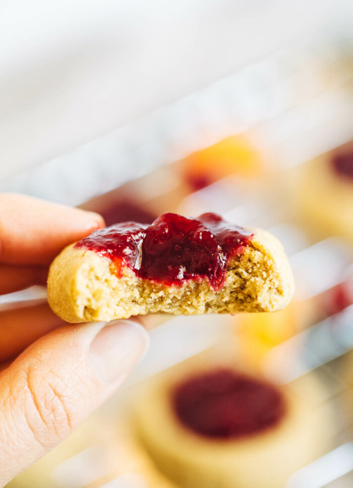 Cranberry Orange Thumbprint Cookies- made with orange zest and cranberry jam, these cookies make for a delicious and festive treat! (vegan + gluten-free)