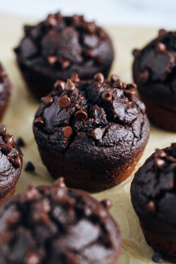 Healthy Chocolate Peanut Butter Muffins- moist and delicious, these muffins taste just like chocolate cake. You would never guess that they're made without dairy, gluten, oil or refined sugar!