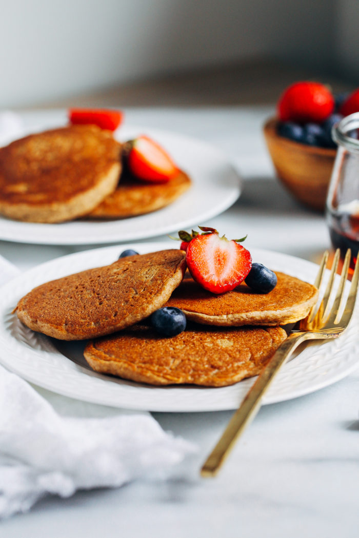 The Best Vegan Oatmeal Blender Pancakes- so light and fluffy, you would never guess they’re made without dairy,  eggs, or gluten. And you probably have everything you need in your pantry to make them!