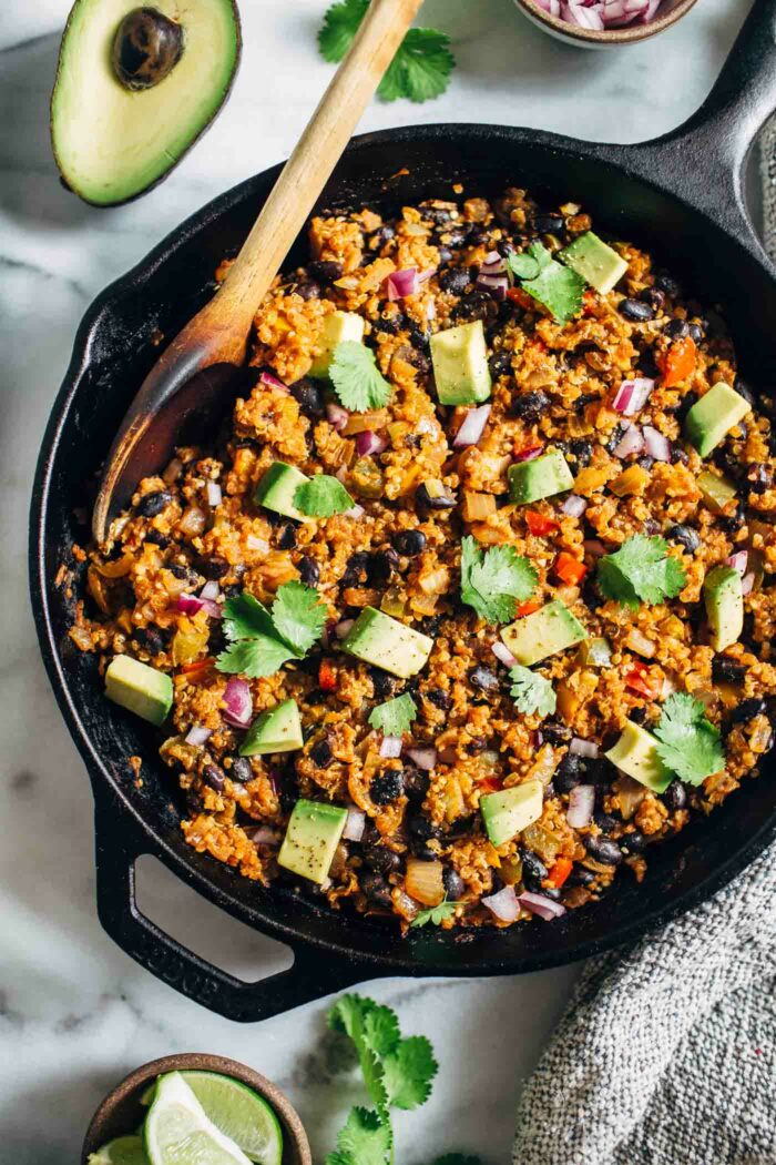 One Skillet Mexican Quinoa- an easy one-pot meal that's perfect for busy weeknights. Each serving has 17 grams of protein! (vegan + gluten-free)