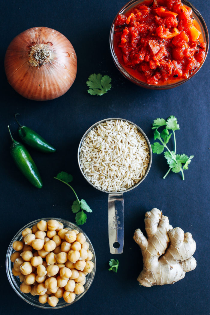 One Pot Chickpea Tiki Masala- an easy and nutritious meal made with warming spices, fire roasted tomatoes, fresh ginger and coconut milk. Just 30 minutes to make! (vegan + gluten-free)