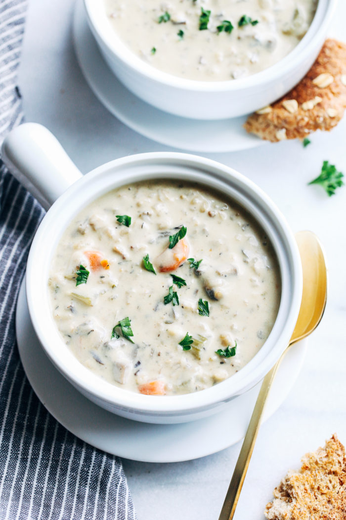 Creamy Wild Rice Mushroom Soup- a lightened-up meatless take on the classic chicken and wild rice soup. You won't miss the meat of the cream in this satisfying vegan version! 