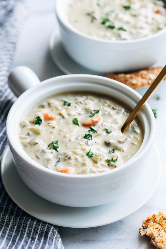 Creamy Wild Rice Mushroom Soup- a lightened-up meatless take on the classic chicken and wild rice soup. You won't miss the meat of the cream in this satisfying vegan version! 