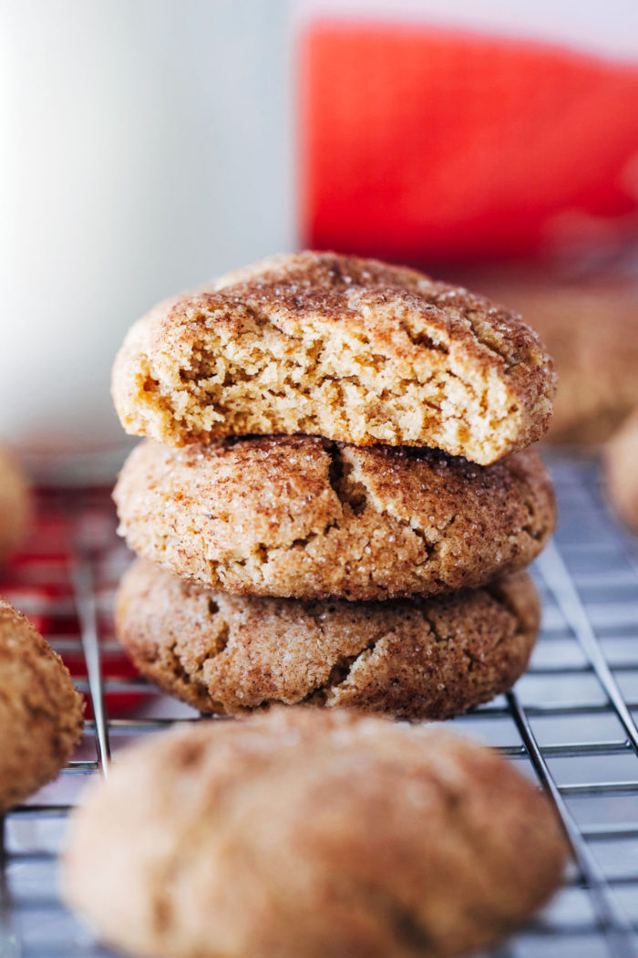 Dreamy Vegan Snickerdoodles- cinnamon sugar cookies with perfectly chewy edges and a pillowy soft center. So good that you would never guess that they're gluten-free and dairy-free!