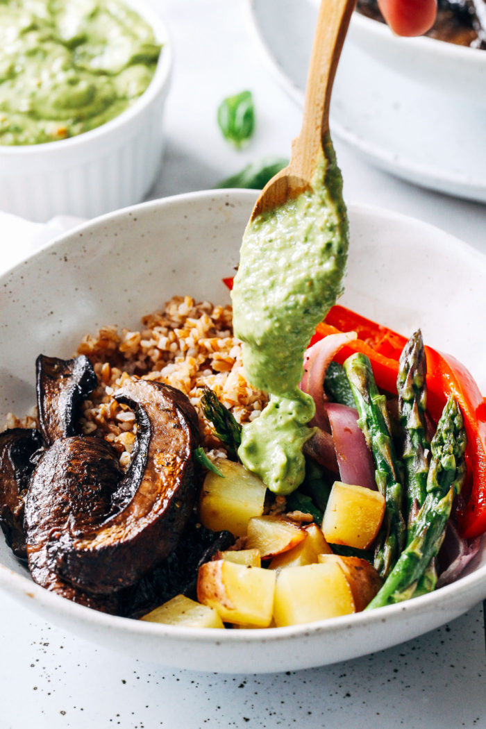 Roasted Mushroom Vegetable Bowls with Avocado Pistachio Pesto- portobello mushrooms and spring vegetables are roasted in one-pan and topped with a creamy avocado pistachio pesto. Super easy, flavorful and satisfying! (vegan with gluten-free option)