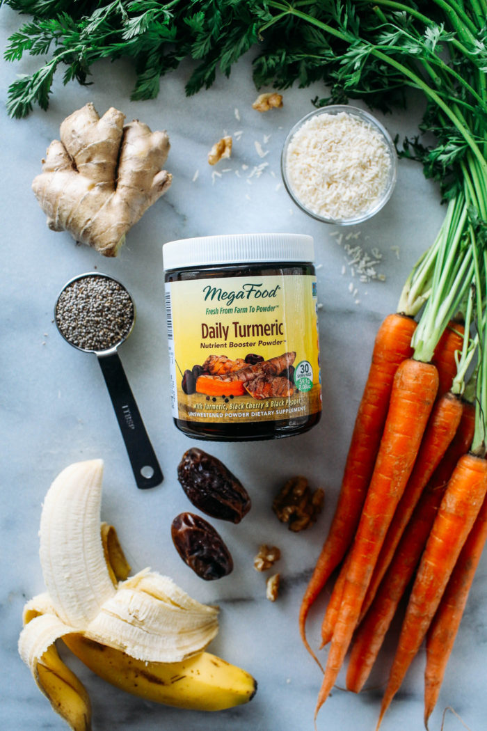 Turmeric Carrot Cake Smoothie- a nourishing blend of whole foods that tastes just like a slice of carrot cake! A great source of vitamins, calcium, iron, protein, and fiber. (vegan + gluten-free)