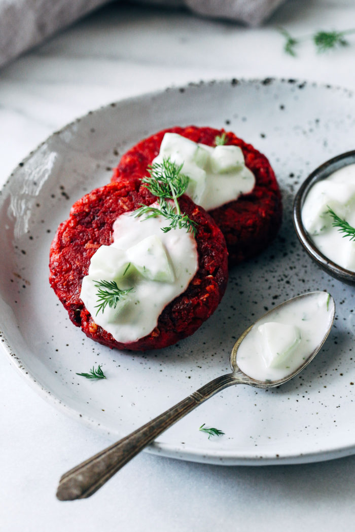 Beet Patties with Vegan Tzatziki- a simple combo of chickpeas, beets and fresh dill topped with a flavorful vegan tzatziki. Each serving provides 14 grams of protein! (vegan + gluten-free)