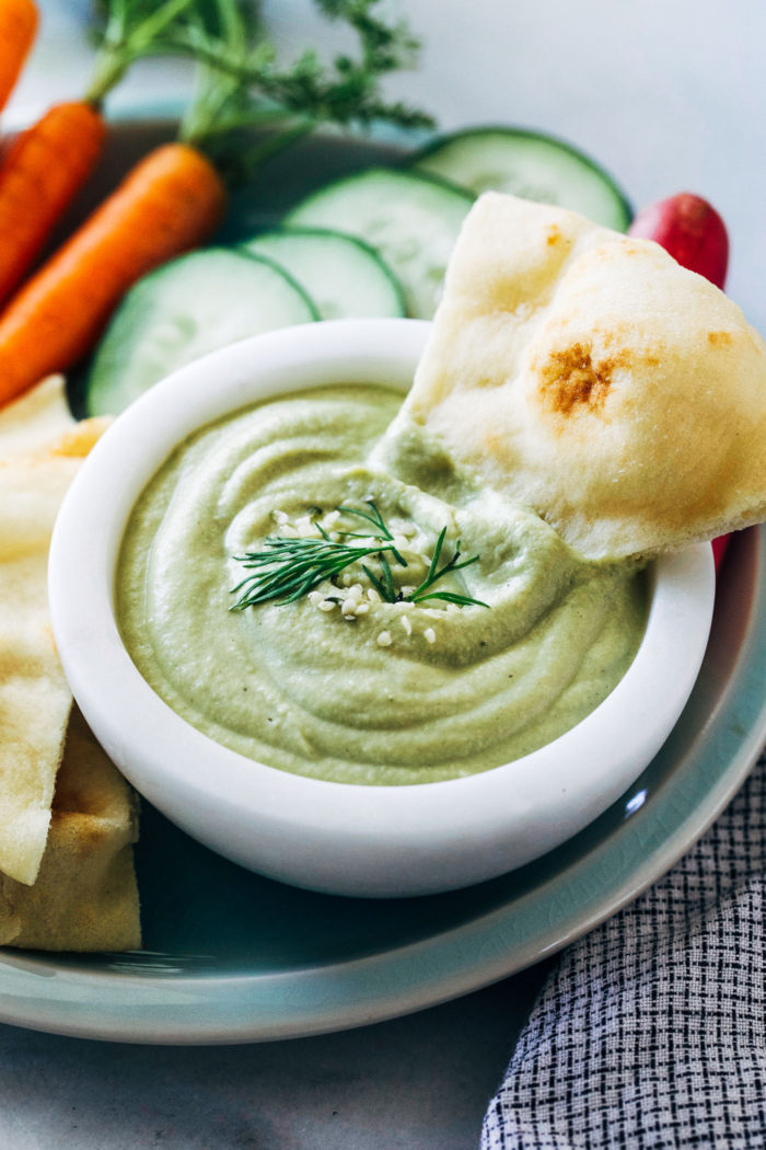 Hemp Seed Ranch Hummus- hemp seeds replace oil in this recipe for a super creamy hummus that's packed full of protein and healthy omega 3 fatty acids. Less than 10 ingredients to make! 