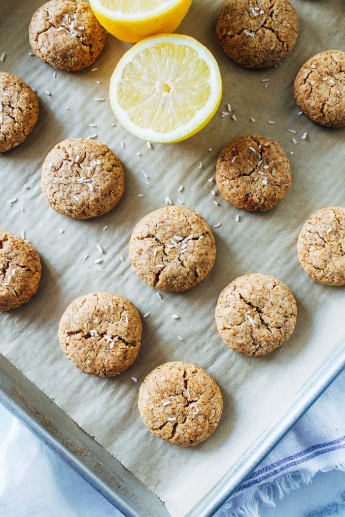 Soft and Chewy Lemon Coconut Cookies- made with fresh lemon zest and naturally sweetened with coconut sugar. You won't be able to eat just one! (vegan + gluten-free)