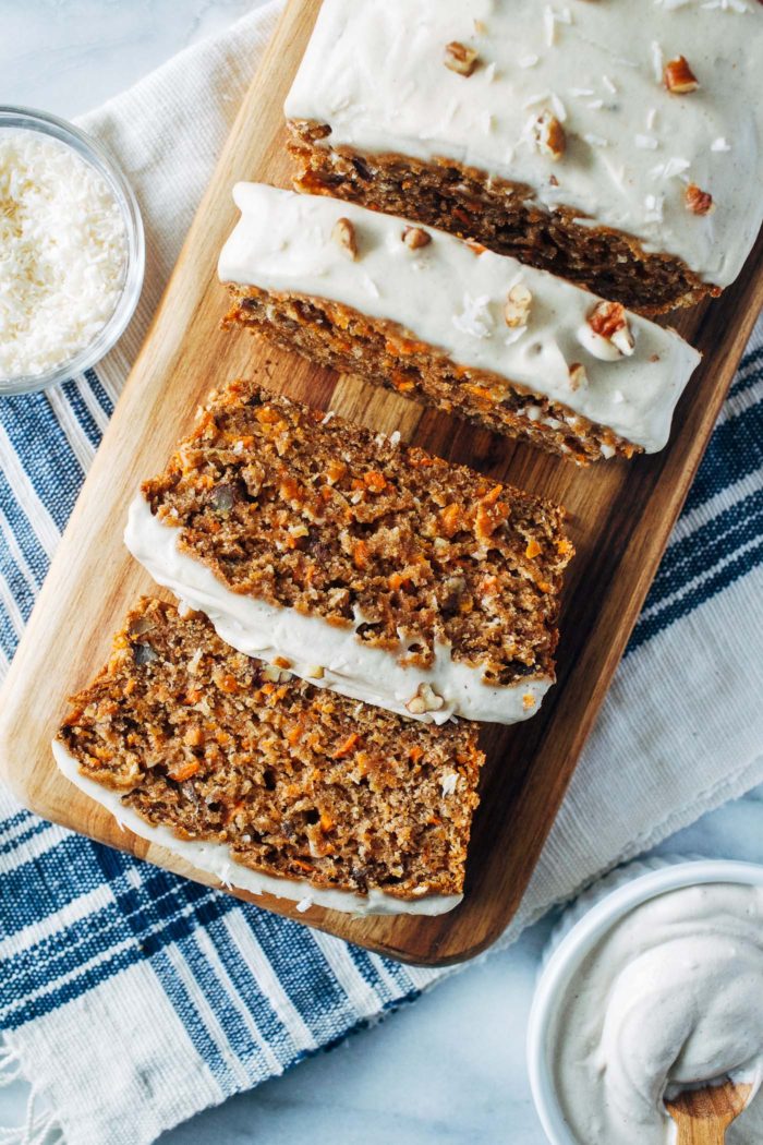 Vegan Banana Carrot Bread with Cashew Cream Cheese Icing- banana replaces egg in this recipe for a lighter take on carrot cake with irresistible flavor. Whole grain, refined sugar-free and dairy-free!