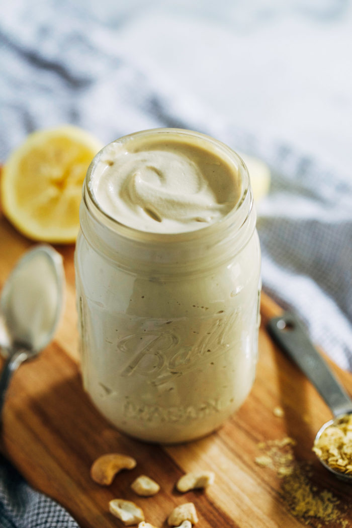 Nacho Cashew Cream- a simple blend of raw cashews, lemon juice and nutritional yeast makes for a tangy and delicious sauce that will make you forget all about cheese! (vegan)