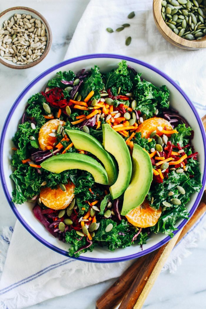 Renewing Rainbow Kale Salad- a vibrant and energizing salad that's a nutritional powerhouse. Each serving packs in 18 grams of protein! (vegan, nut-free and gluten-free)