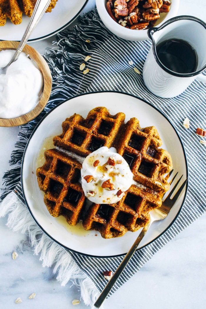 Flourless Vegan Pumpkin Oatmeal Waffles- made with rolled oats and pumpkin puree, these waffles are hearty, satisfying and perfect for fall. Don't have a waffle maker? The recipe makes delicious pancakes too! (vegan, gluten-free + oil-free)