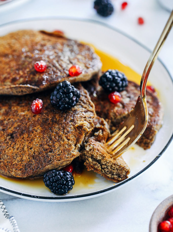 Vegan Buckwheat Gingerbread Pancakes- whole grain and naturally gluten-free, these gingerbread pancakes are sure to leave your stomach full and your taste buds happy! 