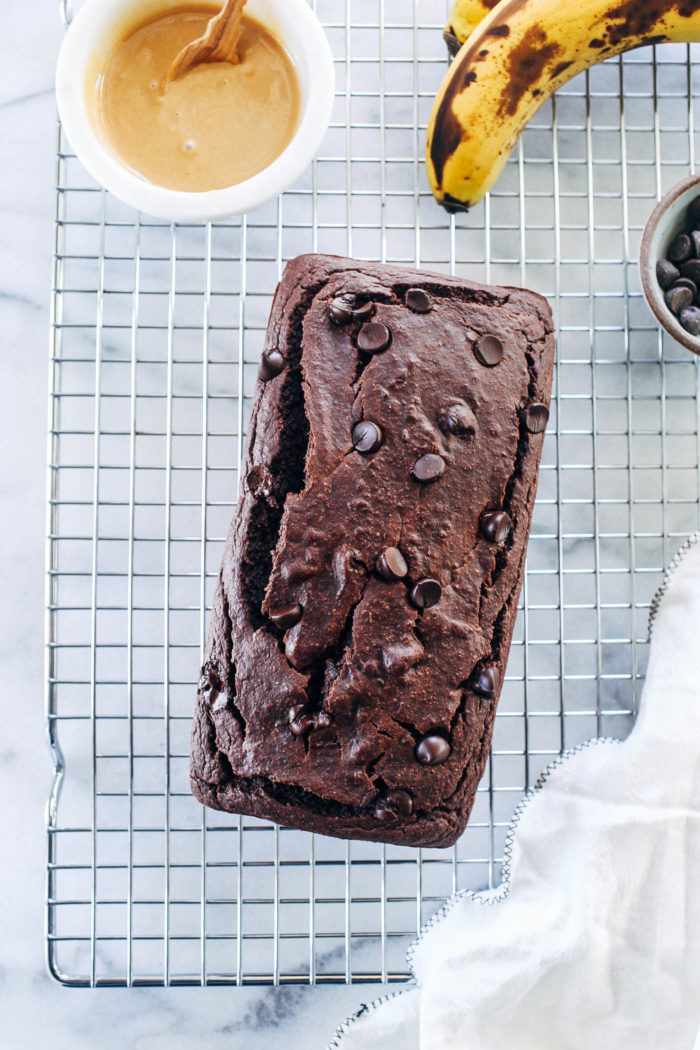 Flourless Vegan Double Chocolate Banana Bread- made in a blender with rolled oats and cocoa powder, you would never guess this banana bread is gluten-free and oil-free!