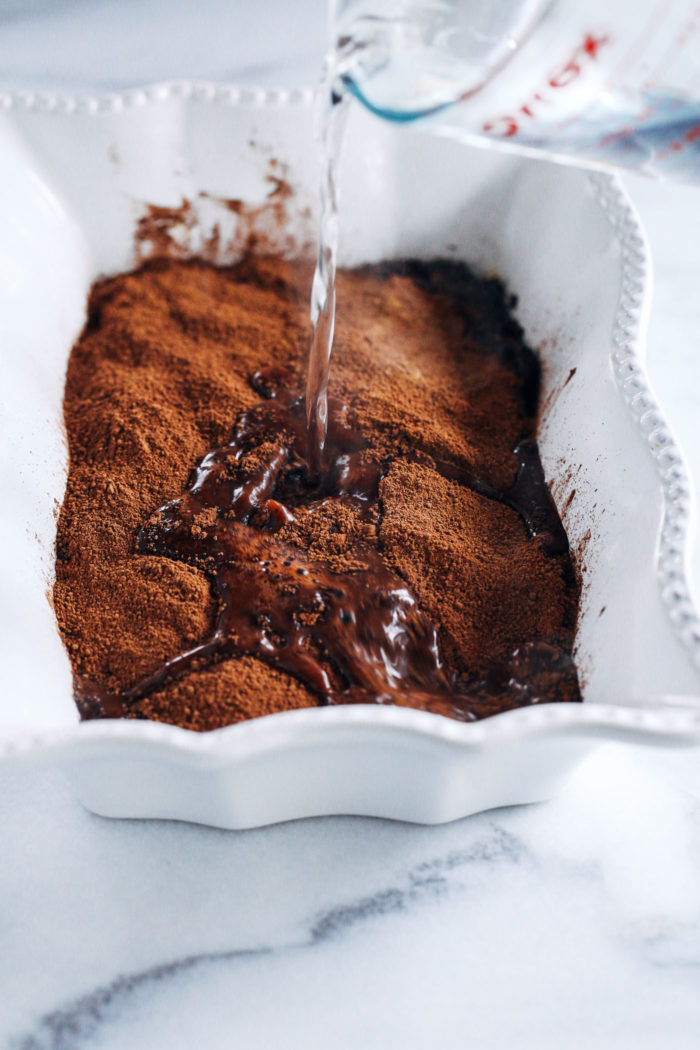 Hot Fudge Chocolate Avocado Cake- made with whole grain flour, coconut sugar and ripe avocado, you'd never guess this sinful dessert is vegan and oil-free!