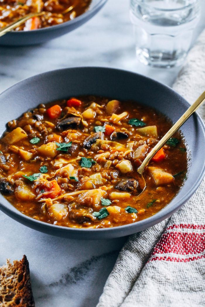 One-Pot Vegan Irish Lager Stew- made with hearty potatoes, cabbage, lentils and mushrooms, this stew is as filling as it is flavorful. (gluten-free + grain-free)