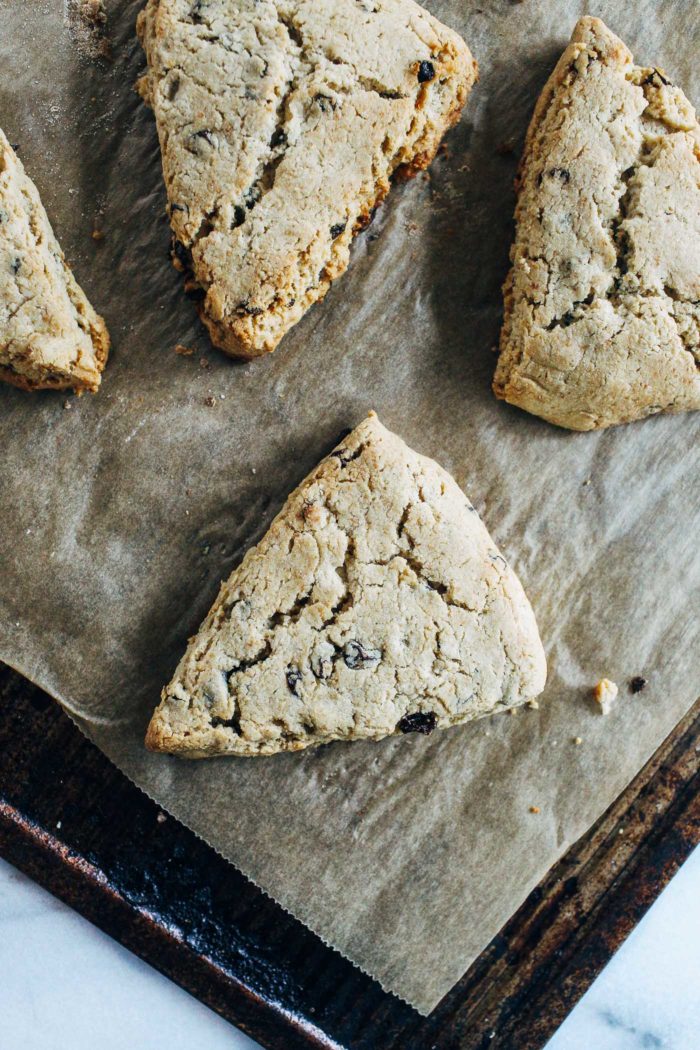 Vegan Irish Soda Bread Scones- all you need is 10 ingredients to make these scrumptious vegan scones. With crisp edges and a soft center, you would never guess they are gluten-free and refined sugar-free!