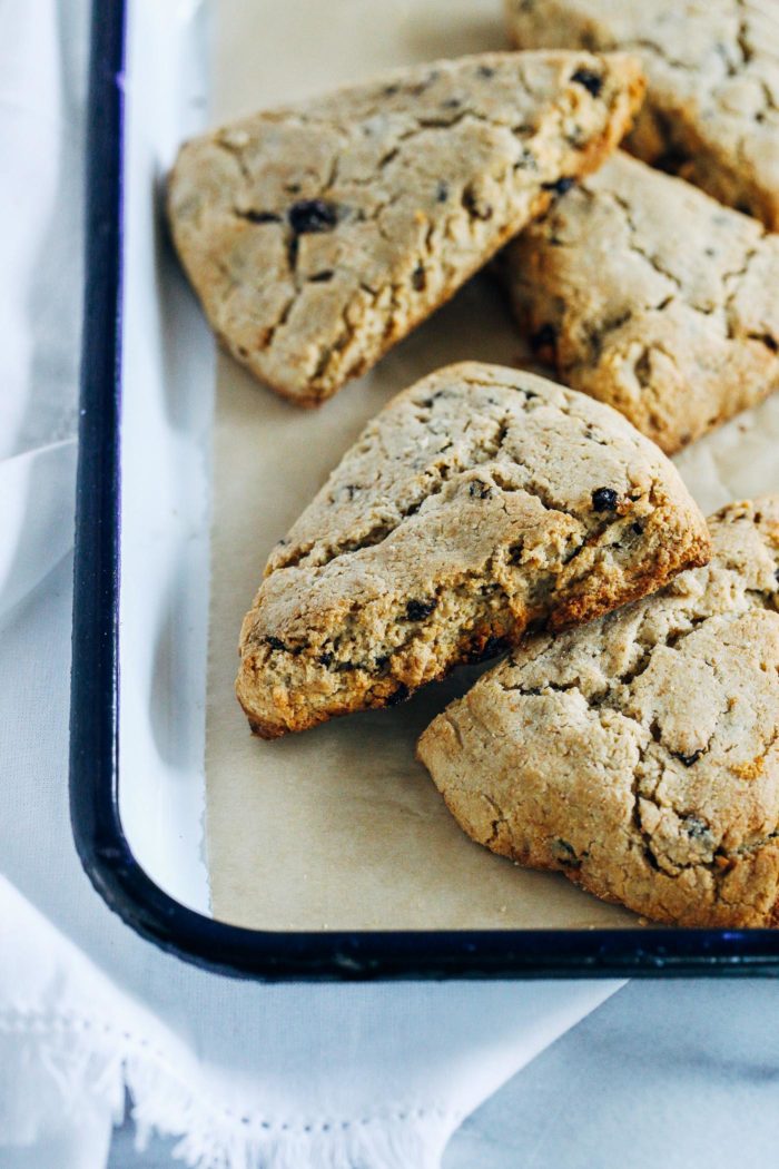 Vegan Irish Soda Bread Scones- all you need is 10 ingredients to make these scrumptious vegan scones. With crisp edges and a soft center, you would never guess they are gluten-free and refined sugar-free!