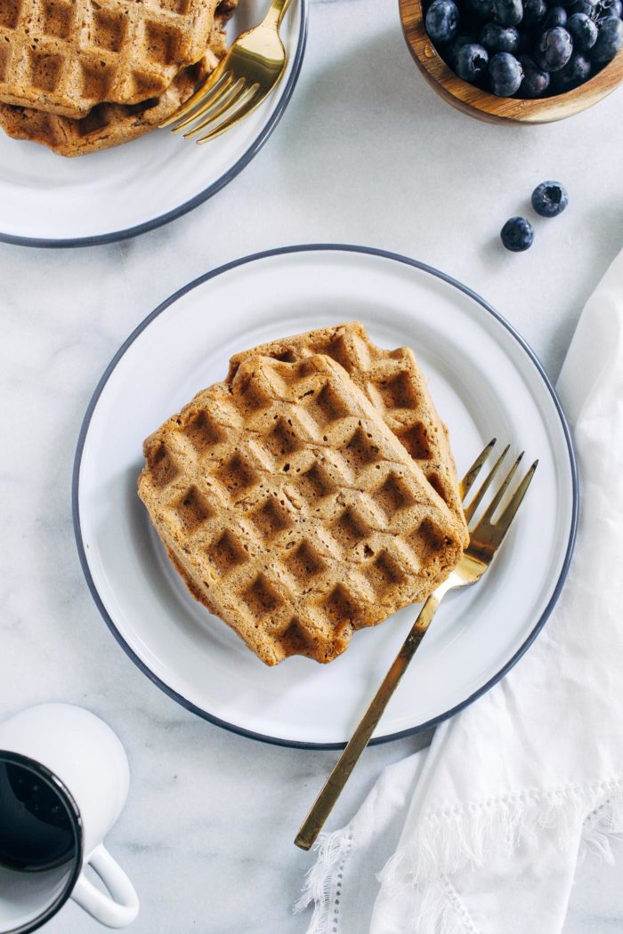 Vegan Gluten-free Oat Flour Waffles- all you need is 10 ingredients to make these crispy vegan waffles. You would never guess they are naturally gluten-free and oil-free too! #vegan #plantbased