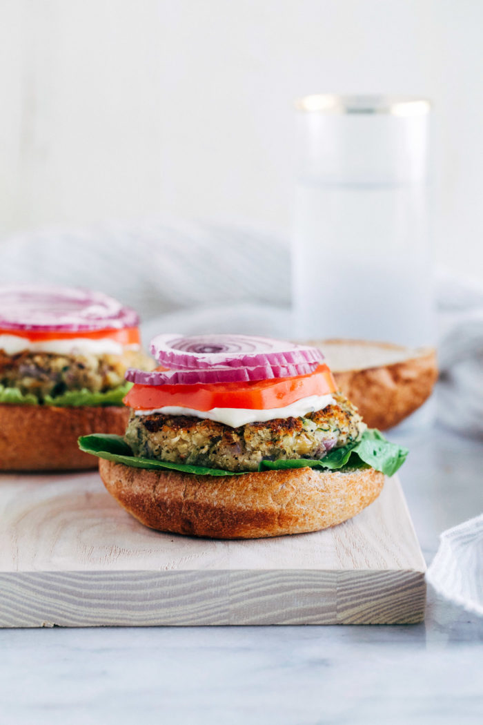 White Bean Zucchini Burgers- less than 10 ingredients and 30 minutes is all you need it make these delicious plant-based burgers! #vegan #glutenfree #plantbased #cleaneating