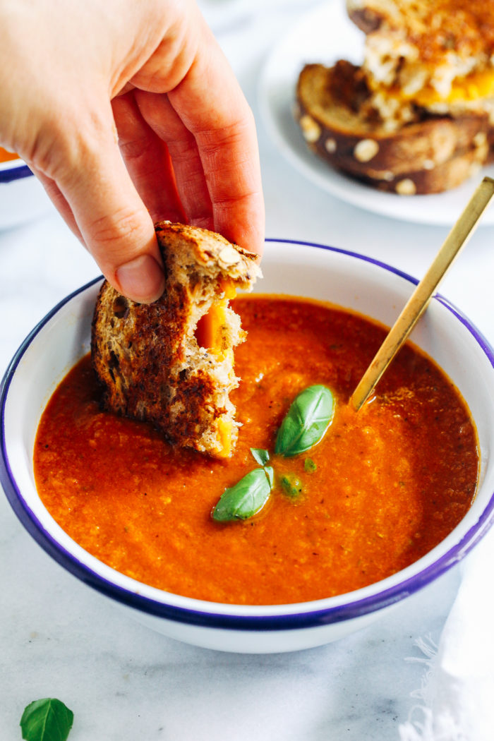 Easy Roasted Heirloom Tomato Soup- all you need is 8 ingredients for this simple tomato soup that is bursting with flavor. Once you try this you'll never eat tomato canned soup again! #easyrecipes #healthyfood #plantbased #dinnerideas #vegan