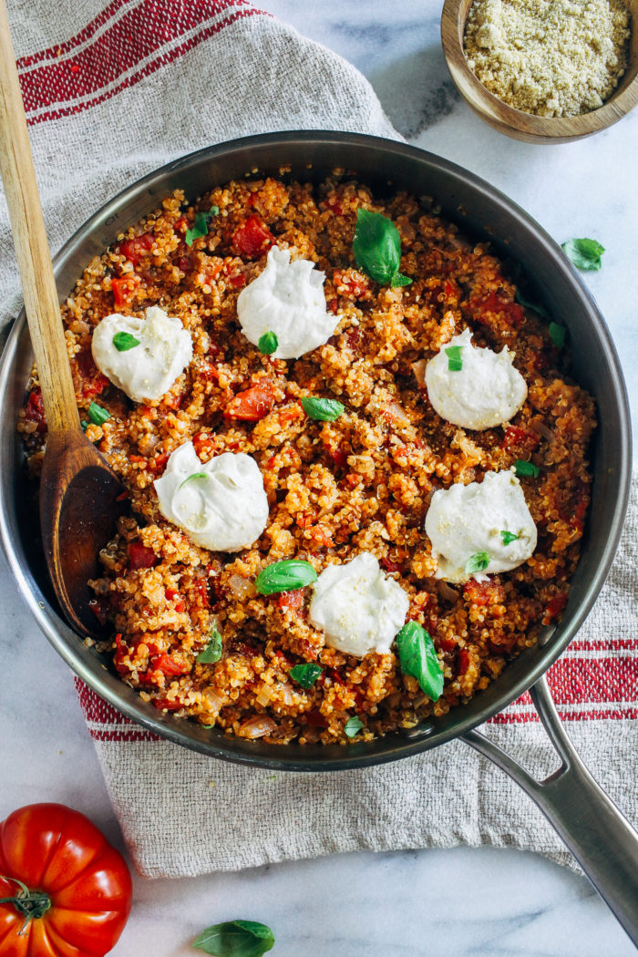 One-Pot Tomato Basil Quinoa with Cashew 'Ricotta'- less than 10 ingredients and 30 minutes for a healthy meal that's packed full of plant-based protein! #plantbased #vegan #plantprotein #healthymeals #quickdinner #easyrecipes
