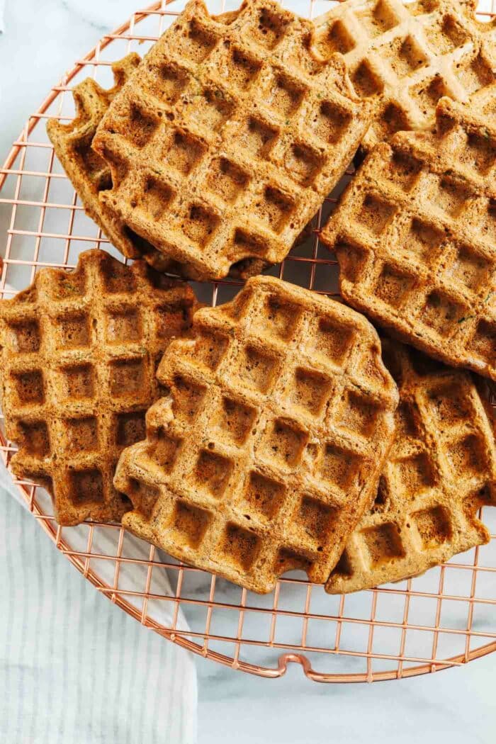 Zucchini Oatmeal Protein Waffles- Made with whole grain oats and grated zucchini, each light and crispy waffle packs 10g of protein! (dairy-free, gluten-free and oil-free)